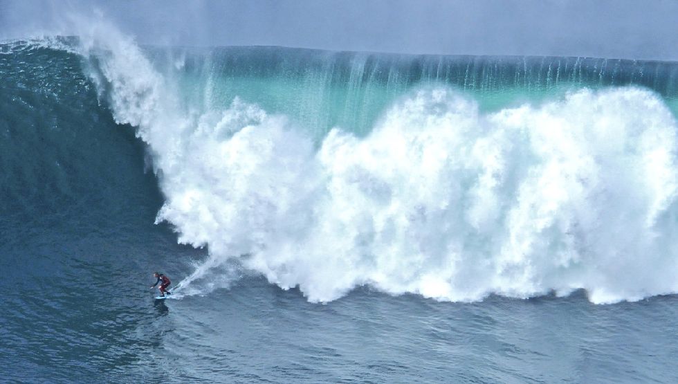 Big wave surfing on Aileen's Wave off the coast of Co. Clare Surfer, Aileen's Wave, Cliffs of Moher, Co. Clare, Wild Atlantic Way